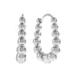 Silver hoop earrings with beaded design on a white background