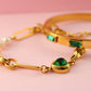 EMERALD EMBRACE ARMBAND
