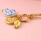 PORCELAIN SHELL KETTING